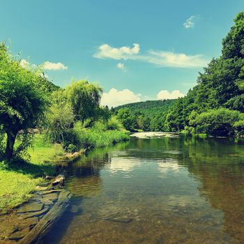 Beautiful summer landscape with river, forest, sun and blue skies. Natural colorful background. Jihlava River, Czech Republic - Europe