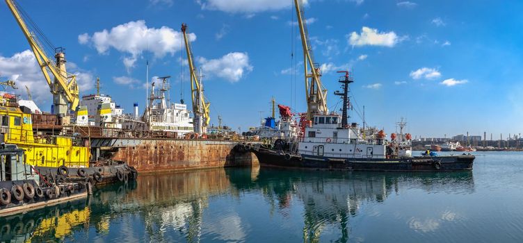 Chernomorsk, Ukraine. 21.03.2021. Tugboats in the Chernomorsk Shipyard on a sunny spring day