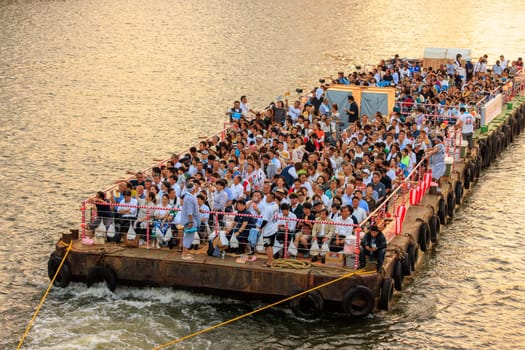 Osaka, Japan - July 25, 2023: Crowded barge on river during Tenjin summer festival. High quality photo