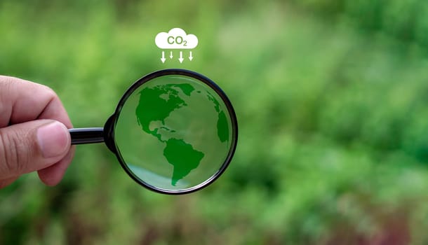 CO2 emission reduction concept, clean and friendly environment without carbon dioxide emissions. Planting trees to reduce CO2 emissions, environmental protection concept.