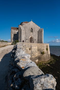 Talmont sur gironde, View of the church Sainte Radegonde 12th century. High quality photo