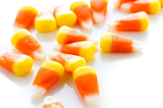 Halloween candy-corn on a white background.