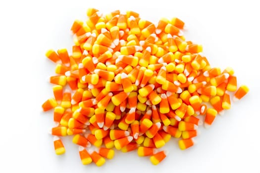 Halloween candy-corn on a white background.