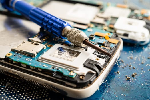 Repairing and upgrade mobile phone, electronic, computer hardware and technology concept.