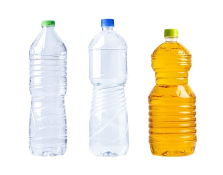 Plastic water and vegetable oil bottle isolated on white background.