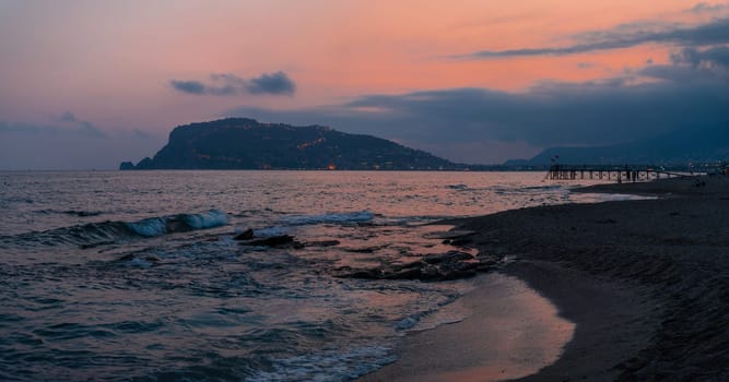 Beautiful evening scene on Alanya beach in Turkey