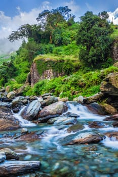 Cascade of Bhagsu waterfall. Bhagsu, Himachal Pradesh, India. Polarizer filter used