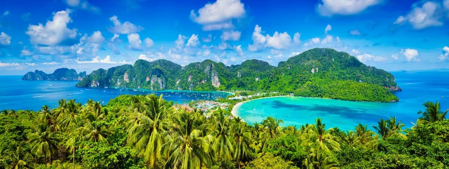 Thailand tropical vacation holidays concept background - panorama of tropical islands Phi Phi Don and Phi Phi Leh in sea. Crabi, Thailand