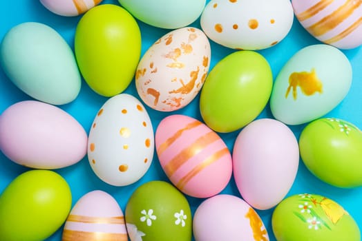Colorful easter eggs background. Alot of painted Easter eggs as background, top view.