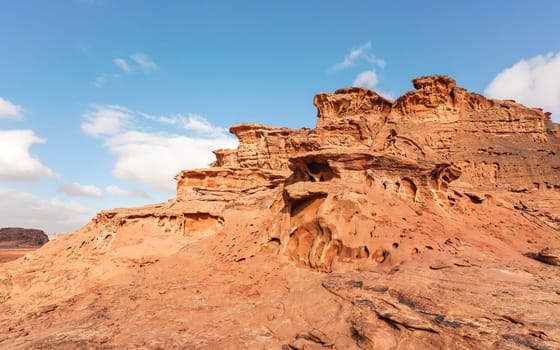 Red orange sandstone rocks formations in Wadi Rum (also known as Valley of the Moon) desert, Jordan.