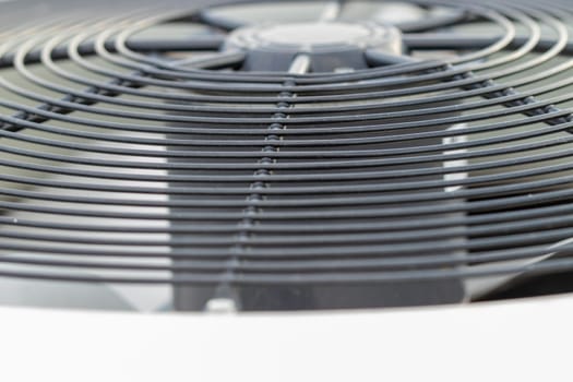 Close up side view of out side air conditioner fan . High quality photo