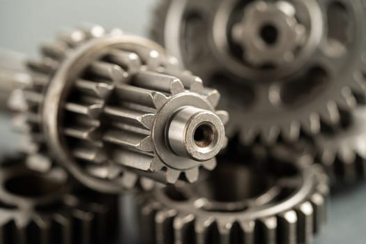 Gear and cogs wheels, clock mechanism, brass metal engine industrial.