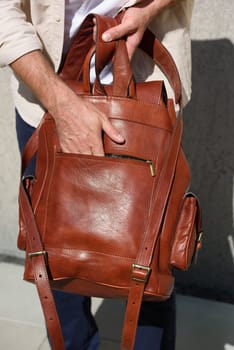 Leather Maroon backpack. backpack for travelers and students.