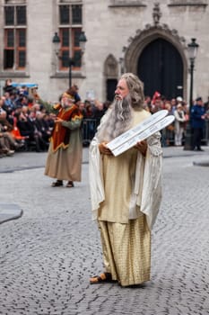 BRUGES, BELGIUM - MAY 17, 2011: Annual Procession of the Holy Blood on Ascension Day. Locals perform dramatizations of Biblical events - Moses with the Ten Commandments. May 17, 2012 in Bruges (Brugge), Belgium