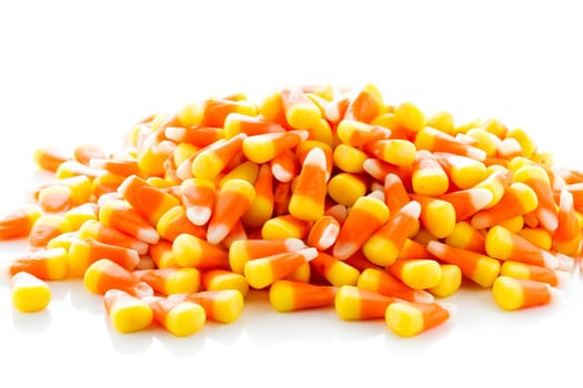 Halloween candy-corn on a white background.