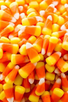 Halloween candy-corn on a white background.