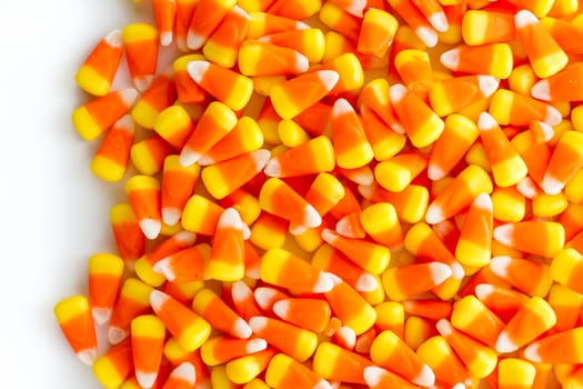 Halloween candy-corn on a white background.