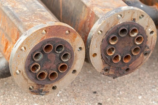 Old rusty extrusion tubing steal back ground . High quality photo