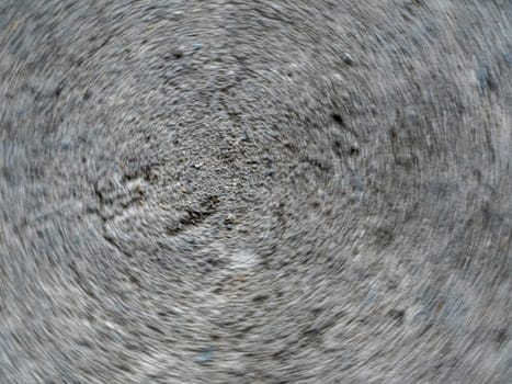 Full frame abstract texture on the rough concrete flooring as grunge background by movement photography