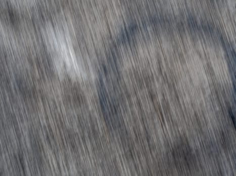 Full frame abstract texture on the rough concrete flooring as grunge background by movement photography