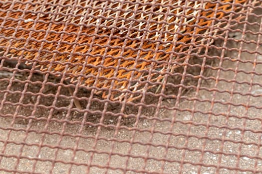 Iron Mesh grading rustic background outside rusty . High quality photo