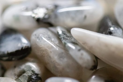 Close up Group of Moon Stones polished in a pile . High quality photo