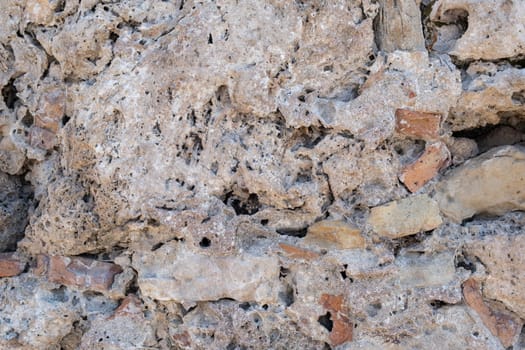 Texture of a stone wall. Old castle stone wall texture background. Stone wall as a background or texture. Part of a stone wall, for background or texture