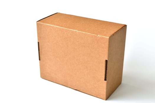 Closed cardboard box isolated on a white background