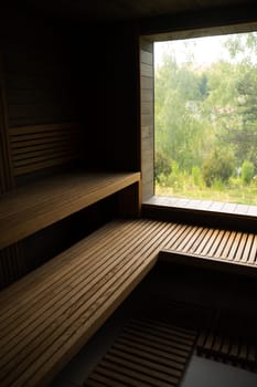 Interior of wooden Finnish sauna. classic wood sauna