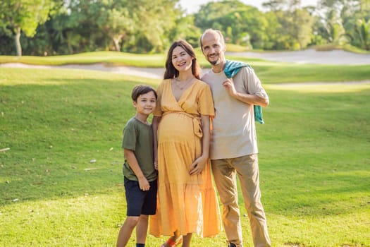 A loving family enjoying a leisurely walk in the park - a radiant pregnant woman after 40, embraced by her husband, and accompanied by their adult teenage son, savoring precious moments together amidst nature's beauty. Pregnancy after 40 concept.