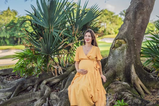 A serene and radiant pregnant woman after 40, surrounded by nature's beauty in the park, cherishing the journey of motherhood with a glowing smile.