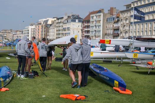 DIEPPE, FRANCE - MAY 25, 2019: French Rowing Championship. Water Rowing boats on the grass.