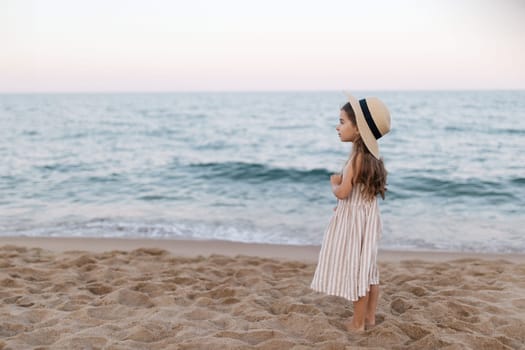 Little girl enjoying summer vacation at the sea.