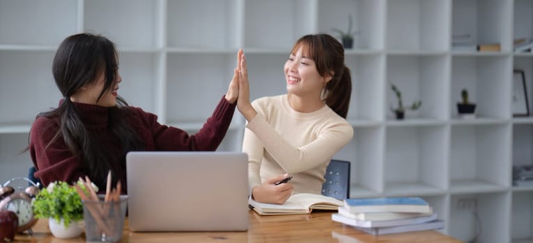 startup a business uses high five as a sign of success..