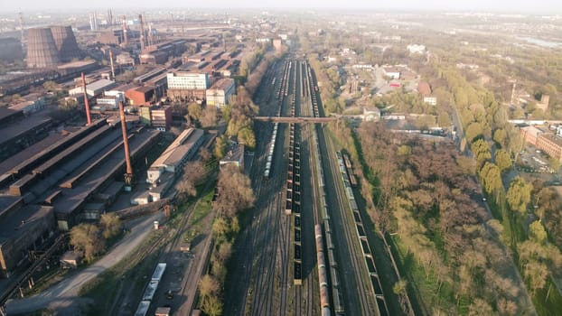 Aerial Top view to railway cylindrical tank shipping containers Rail. Striped creative transport industry representation. railroads and freight trains to transport cargo download photo