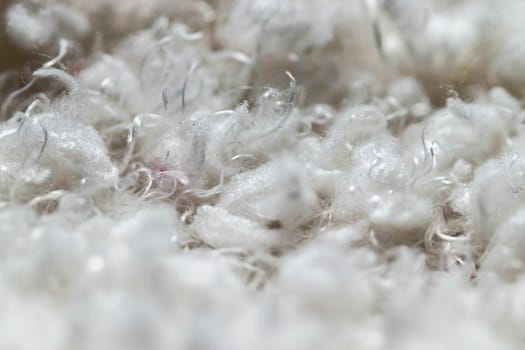 Background White Fuzzy Fluffy cotton scarf close up . High quality photo