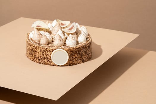 A scrumptious desert plate featuring a meringue desert, served on a cardboard plate and topped with cream