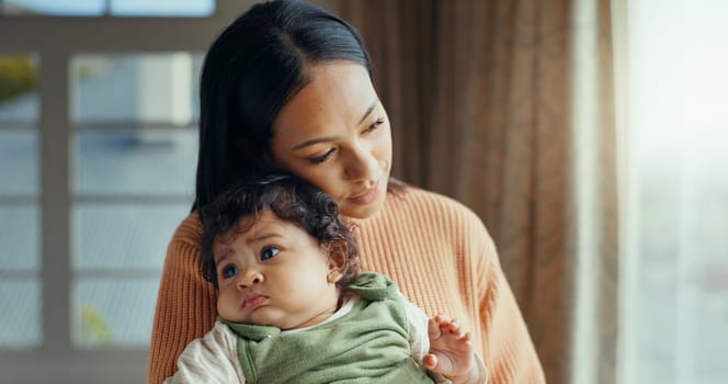 Love, mom holding baby in home and bonding with care and hug, holding hands and rocking to calm child. New mother with newborn and safety and support from woman thinking of future comfort in house