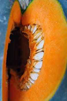 slice the organic pumpkin with a knife,