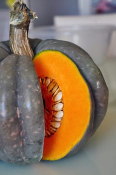 slice the organic pumpkin with a knife,