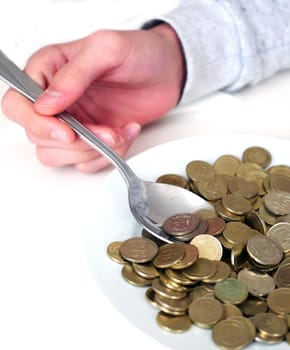 spending money, rich people spending their money eating, coins in plate on table, a spoonful of turkish lira, coins in a plate