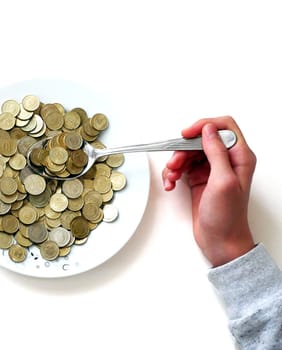 spend money,eating large amounts of coins and spoons,money on a dinner plate, a spoonful of turkish lira, coins in a plate