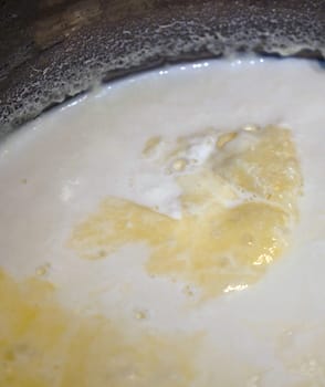 cooked cow's milk and the milk cream formed on it, milk fat,