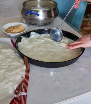 Turkish Dessert Güllaç, A Woman Making Güllaç Dessert,Turkish Dessert Made in Ramadan, Güllaç with Milk,