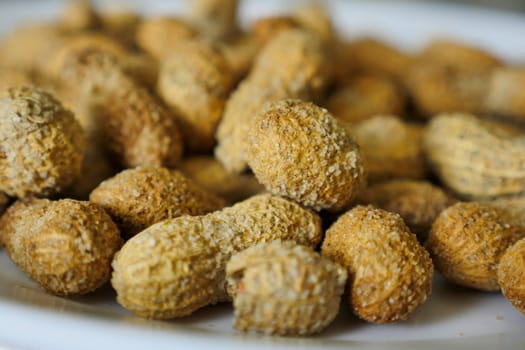 close-up shelled peanuts,shelled and salted peanuts,roasted peanuts,