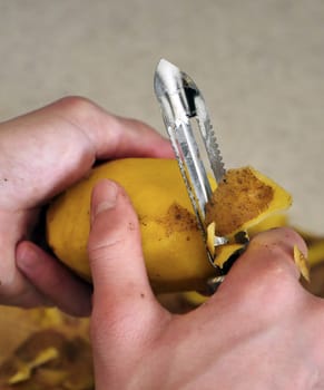 close-up peeling potatoes,person peeling potatoes to prepare a meal, close-up peeled potatoes and unpeeled potatoes,