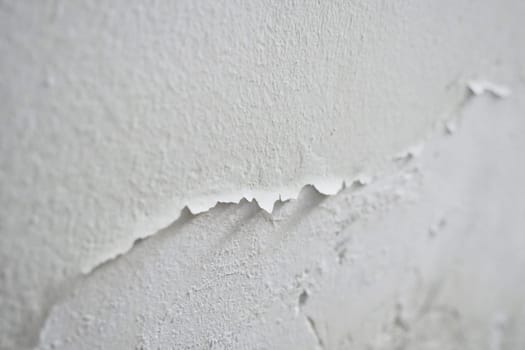 Paint swelling on the wall due to moisture, damp wall samples, damp wall and damage to the paint,