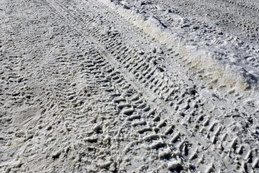 car tire marks on the snow, tire marks on the snow,