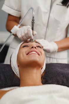 Shot of a beautiful young woman on a facial treatment at the beauty salon.