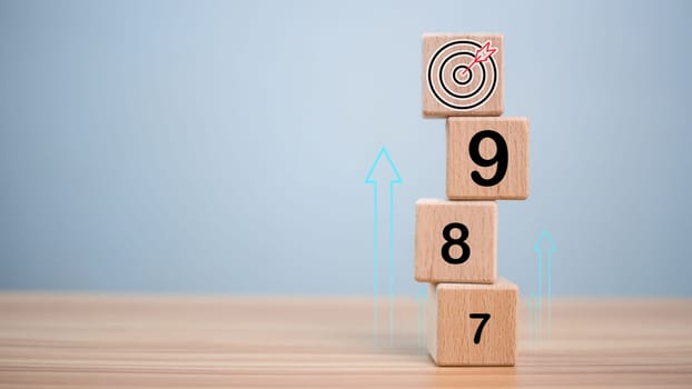 Numbers sequencing almost reaching goals and achievements on wooden blocks. Startup concept. Business concept. Management concept. Business planning concept.